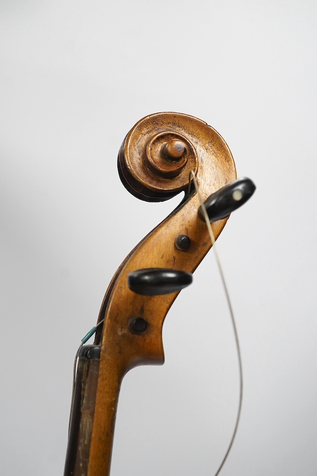 Two late 19th or early 20th century violins, one with case, back of largest measures 36cm. Condition - poor to fair